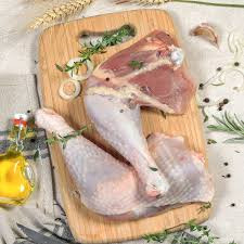 Cuisses de poulet (1kg)		Nos Produits